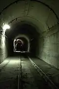 Sub-horizontal conduit tunnel