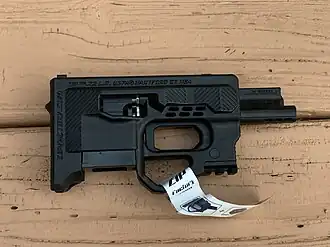 The ZiP .22 LR in factory new condition. No stickers removed, safety off, empty magazine loaded.