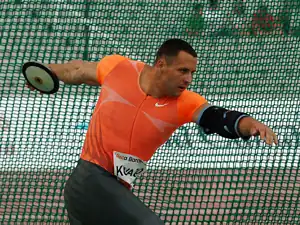 Image 7Zoltán Kővágó preparing to spin and throw in discus throw (from Track and field)