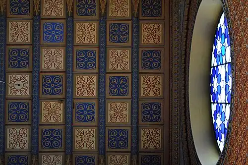 Ceramic ceiling decoration and stained glass of Rumbach Street synagogue