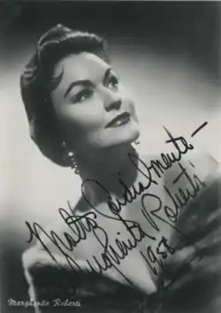 A black and white photograph of a woman