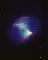The Dumbbell Nebula, Messier object 27 (M27), NGC 6853, in the constellation Vulpecula, as seen by the Kitt Peak 4-meter Mayall telescope in 1988.