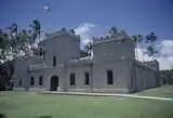 Iolani Barracks in Honolulu, Hawaii. Photograph by Alan Gowans. Department of Image Collections, National Gallery of Art Library Archived 2014-03-24 at the Wayback Machine.