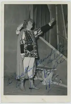 Black and white photographs of a young man standing in theatrical costume