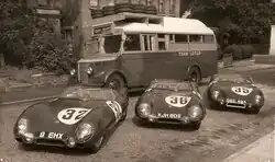 The three works Lotus XI entries, in from of the team's race transporter.