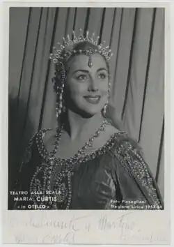 A black and white photograph of a woman