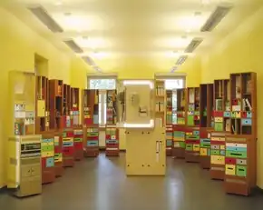 Fourteen interlocking and movable display cabinets with books and personal artifacts related to children's author Erich Kästner