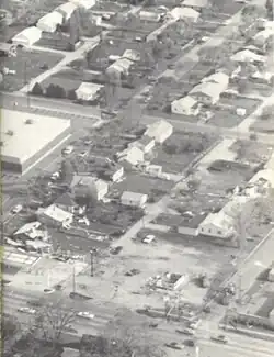 Aerial view of several homes and structures that were damaged by the tornado