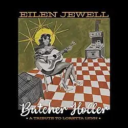 framed color sketch of Loretta Lynn sitting strumming guitar in checker-tiled kitchen