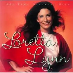 photo of Loretta Lynn in white and red on red-orange background