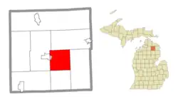 Location within Montmorency County (red) and a portion of the administered CDP of Atlanta (pink)