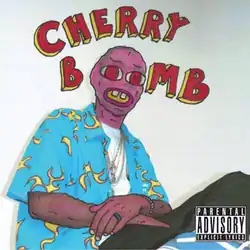 A picture of Tyler sitting and crossing his legs, edited and illustrated for Tyler to resemble a pink cartoonish character with bulging red eyes and buck teeth.