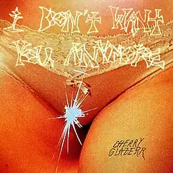 A photo of a woman's crotch, wearing panties with a white splotch on them