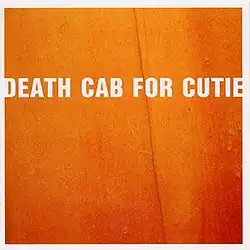 A close-up to a box with the words "Death Cab For Cutie".