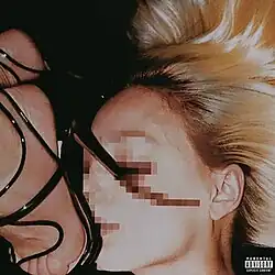 A partially censored image of a woman having her eye pierced by a high-heeled shoe