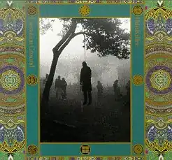 Black-and-white photo of a man hung from a tree
