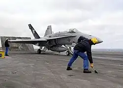 US Navy F/A-18 Hornet launches from Charles de Gaulle