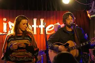 James performing live with Shane Nicholson