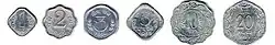 Row of six differently-shaped aluminium coins, arranged by size
