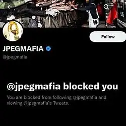A Twitter screenshot from a user on JPEGMafia's page that says they are blocked from following him