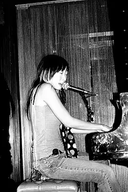 Lui performing in 2010