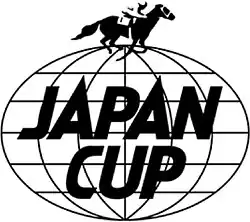 The Japan Cup Logo; a horse and jockey mid run on top of a globe wireframe. The words 'JAPAN CUP' are in front of the globe in bold black.