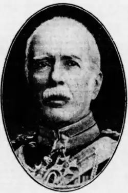 Russel, white-haired and moustached wears a general's uniform and the insignia of a Commander of the Royal Victorian Order around his neck.