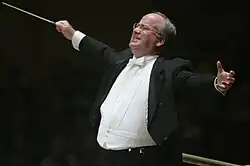 Jonathan May conducting at Carnegie Hall