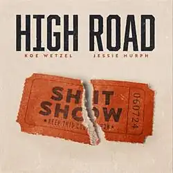 A ticket reading "Shit Show" and "Keep this Coupon" ripped in half, below song title and singers' names