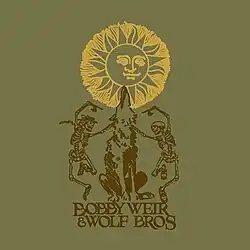 Two dancing skeletons, and a wolf howling at the sun