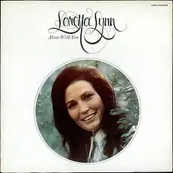 photo of Loretta Lynn in circular frame on white background