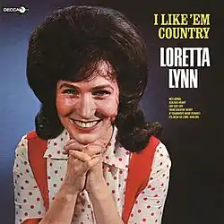album cover photo of Loretta Lynn in red and white