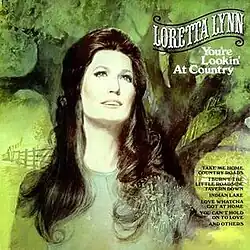 realistic drawing of Loretta Lynn in green