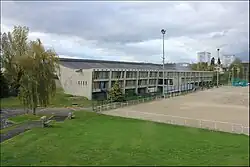 A building next to a playing field