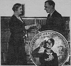 He's receiving the winner's check from Schain in 1931. The to-be poster (insert) was in vogue until 1937.