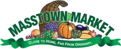 "Masstown Market" in green text with a collection of fruit and a cornucopia. Text on a green ribbon below reads "close to home, far from ordinary"