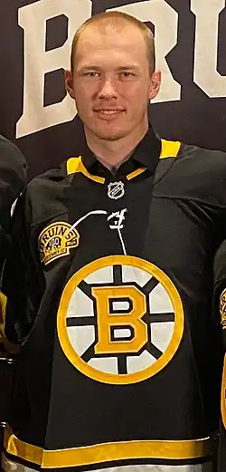 Man wearing a Boston Bruins jersey