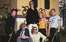 New Radicals touring group c. 1998. Left to right: Jim McGorman, Gregg Alexander, Stuart Johnson, Sasha Krivtsov, Danielle Brisebois, and Brad Fernquist.