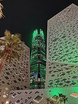 Public Investment Fund Tower in Riyadh lit in green, 2024