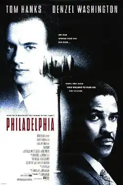 A monochrome image of Andrew Beckett (Tom Hanks) and Joe Miller (Denzel Washington) separated by a gavel showing the Philadelphia Skyline. Text reads "No one would take on his case... Until one man was willing to take on the system." The film's credits appear on the bottom left.