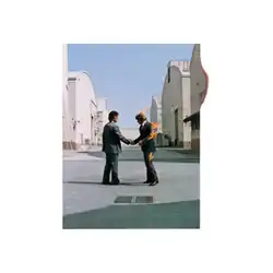 On a white background, an image of two men dressed in dark grey business attire standing in the grounds of a Hollywood film studio, facing each other and shaking hands. The man on the right's hair and clothes are on fire, but he seems oblivious to the fact. The upper right edge of the photograph appears singed.