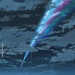 A dark-blue and purple hued comet flies over a cloudy night sky. Near its head, it splits in two. On the left edge of the album cover, "Your Name" is spelled out.