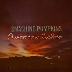 A photograph of a deep red and yellow sunset, with the band and album names typed in two different fonts over the middle.