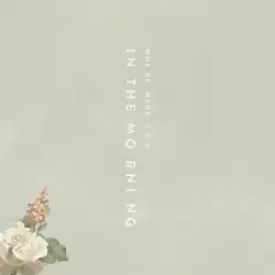 The cover consists of a floral design in the lower left corner with the title spelled out vertically in the centre in two columns