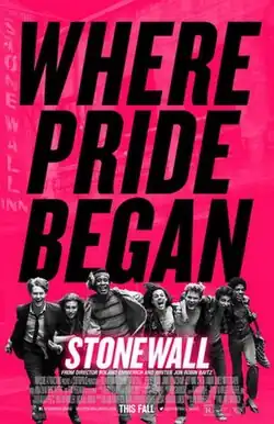 A group of young adults happily run, atop a pink background, with the tagline "WHERE PRIDE BEGAN" in black letters above them.