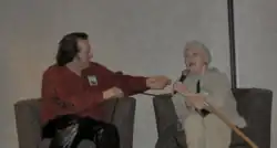 two seated people
