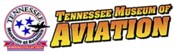 Three-star flag of Tennessee withe silhouette of an airplane