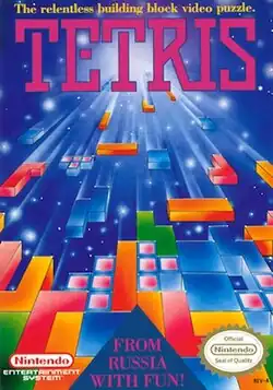 A drawing of multicolored tetromino blocks falling down and stacking on top of each other. The words "The relentless building block video puzzle. Tetris" are at the top. At the bottom is the phrase "From Russia with Fun".