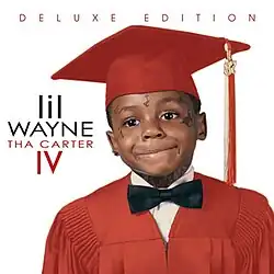 This version of the cover shows both the album's name and Lil Wayne's graduation outfit being a reddish color, while the background is plain white. The "DELUXE EDITION" text is on top of the artwork, pushing the artist's name, album's name, and young Lil Wayne down slightly.