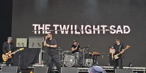 The Twilight Sad playing at Crystal Palace Bowl in August 2025. Left to right: MacFarlane, Graham, Nicholas Willes, Alex Mackay.